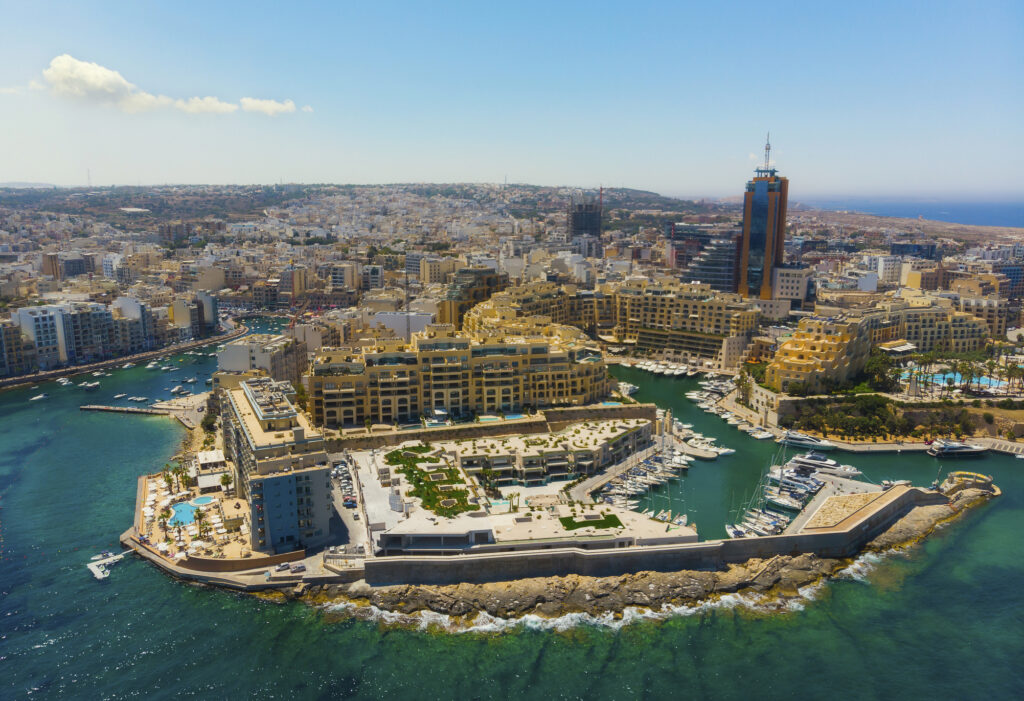 Aerial view of St. Julians city and Portomaso tower. Mediterranean sea. Malta country. Europe. Summer